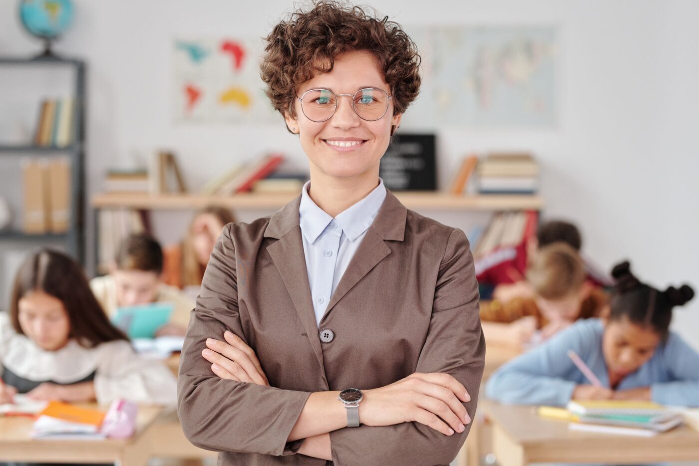 A qualified teacher in a classroom